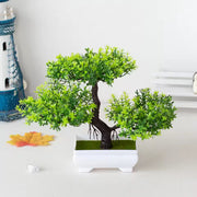 A set of artificial bonsai trees, plants, new homes, decorations