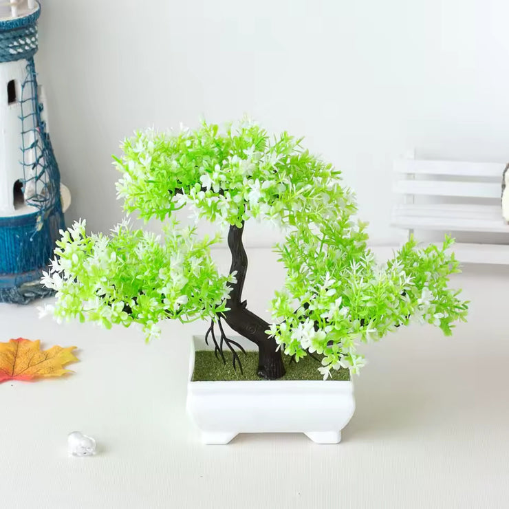 A set of artificial bonsai trees, plants, new homes, decorations